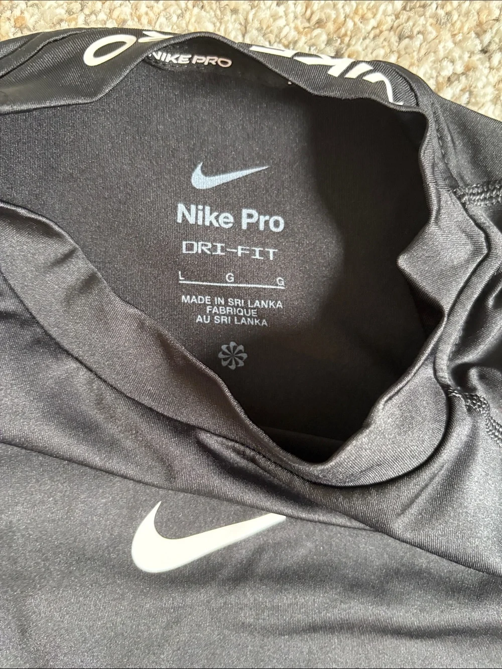 Nike boys Black Long-Sleeve Dri fit with White Swoosh